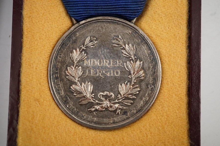 Two cased World War II medals; a Spanish 'Grand Cross of Al Merito En Campana', ('Order of Merit in the Campaign') breast star and an Italian medal of military valour, inscribed and dated 1943. Condition - fair to good.